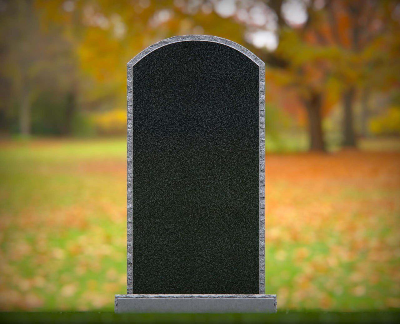 Single Upright Granite Headstone with Rock-Pitched Border