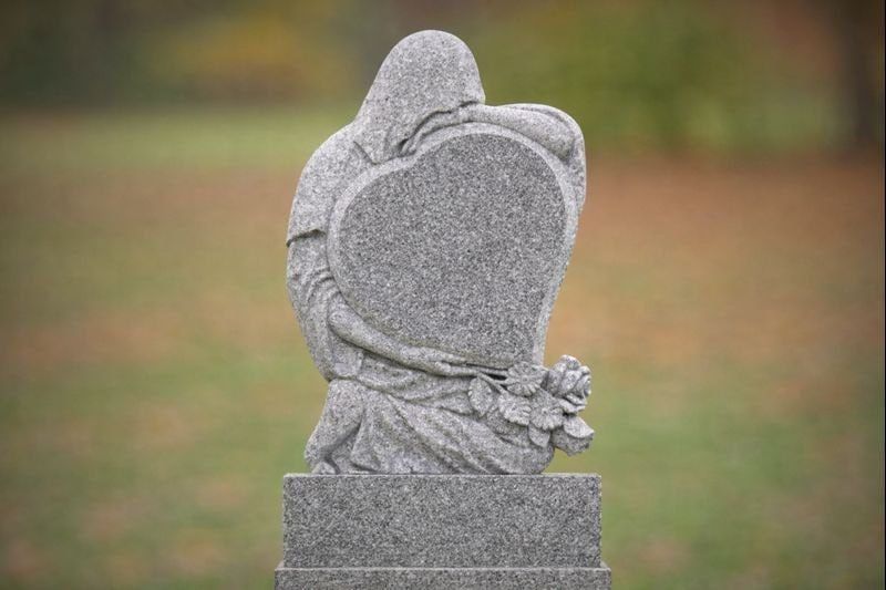 Guardian Embrace Heart Granite Headstone